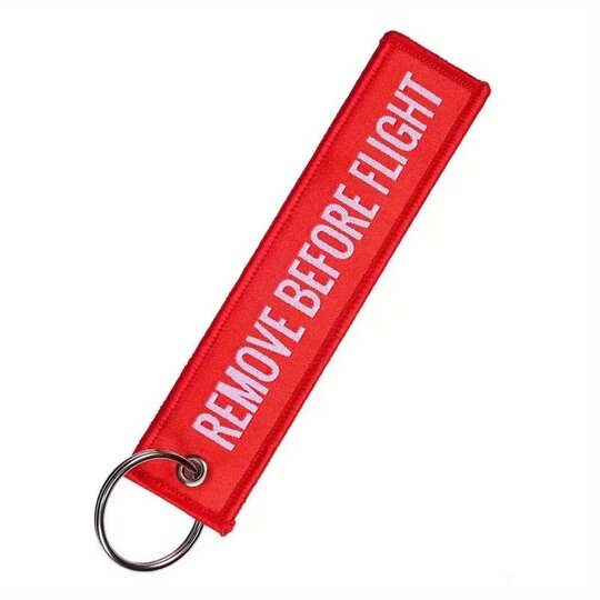 Kľúčenka remove before flight - Cervenajpg